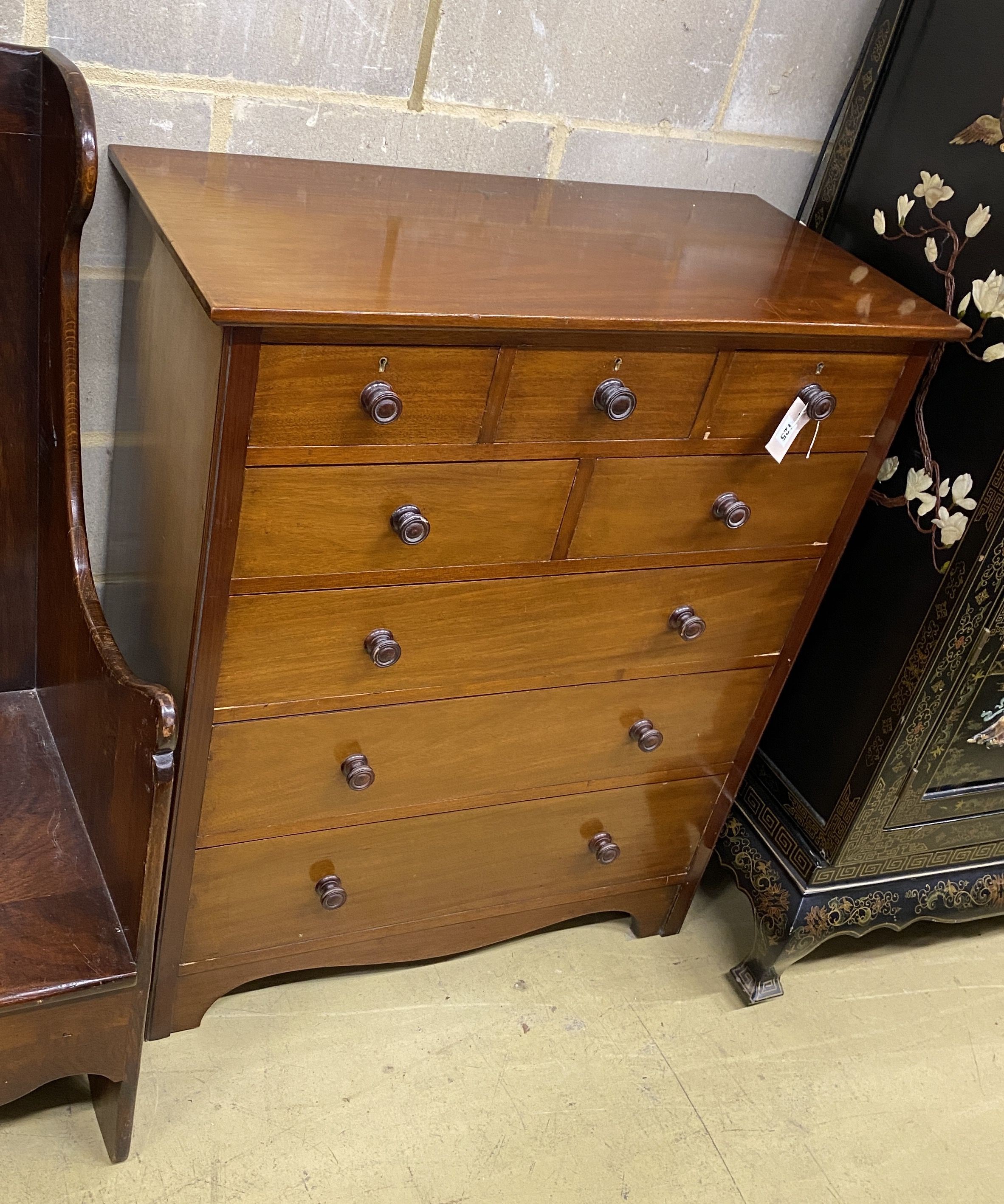 An Edwardian mahogany chest, stamped Flashman & Co., width 92cm, depth 45cm, height 107cm